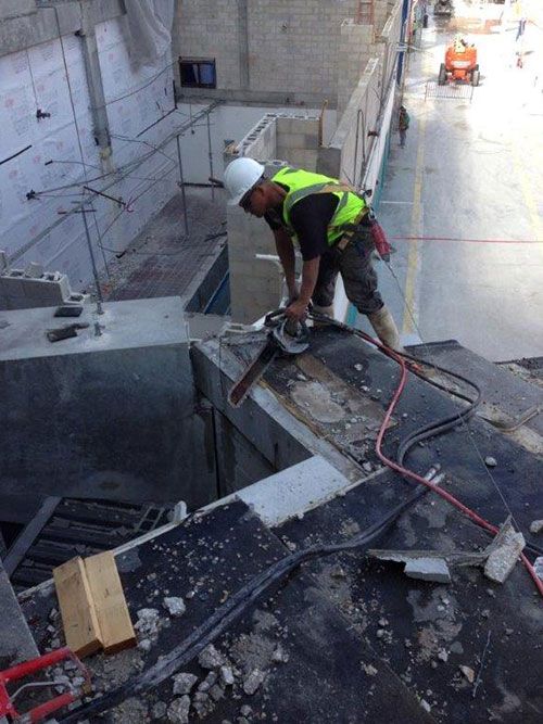 A construction worker is working on a construction site.